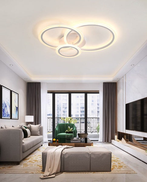 Lights of Scandinavia - Olympia - Modern simple white LED ceiling light. Fits most rooms and creates a harmonic atmosphere with the possibility to change lighting features with remote control Aluminum body and frame, acrylic LED covers.   Application: Living room, Bedroom, Hall, Lobby, Hallway, Aisle, Balcony etc.     Olympia comes in 3 different sizes:  Single circle - D40cm, 5-8m2  Two circles - D30cm x D50cm, 8-12m2  Three circles - D20cm x D30cm x D40cm, 12-18m2 D30cm x D40cm x D50cm, 18-22m2 D40cm x D50cm x D60cm  Height: 12cm